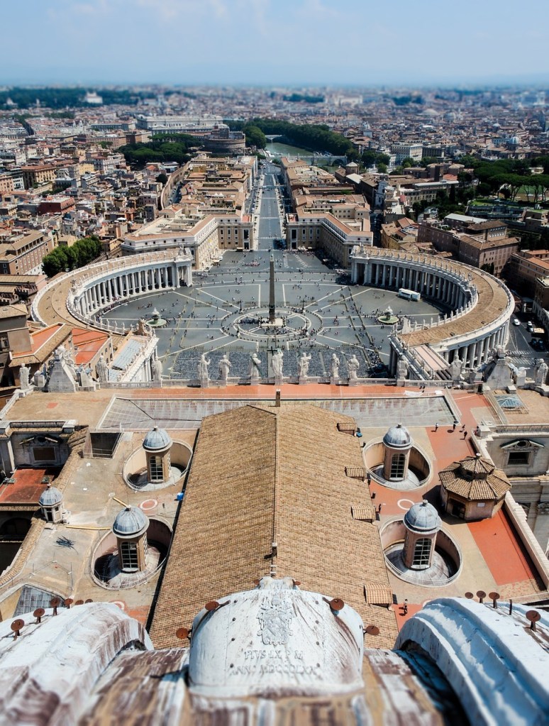 A breathtaking image of the Vatican City, featuring the grand St. Peter's Basilica and the iconic Vatican Museums, nestled amidst lush greenery and vibrant Renaissance architecture.