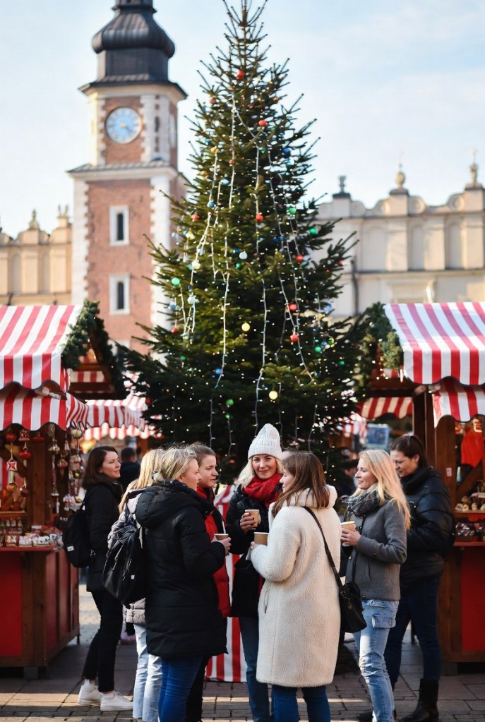 Goup of girls enjoying their time at Krakow Christmas Market
